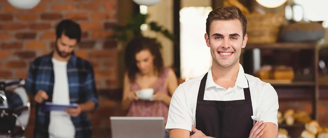 Male server in a coffee shop